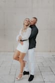 This dress was PERFECT for my engagement shoot! The material is super high quality, and the dress itself is so comfortable. I walked around in it for hours, and it never rode up on my legs. I kept intentionally shifting the sleeves to be up/off the shoulder for a couple of different looks! It'd also be perfect for a bridal shower, bach party, or rehearsal dinner! - Sarah H.