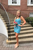 This dress is beautiful! The color is stunning, and the design is well done. The straps are adjustable which my daughter loved! It had some stretch that made it very comfortable. The length worked well for my tall daughter too! - Ashley H.