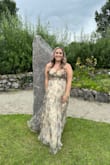 I bought it for a wedding in Ireland. I am always a 10 but could not get the zipper up. Disappointing that the dress only went up to a 10, but I'm going to get into it eventually! Amazing material and looks even better in person! Length will need to be altered, as I'm 5'4 as well. I'd recommend sizing up and allowing time for alterations on length if you are shorter. - Katie P.