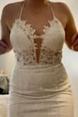 This gown fit so well. I almost went with another more simple Lulus style but ended up with this one. I'm usually not a glamour type of gal, but the glitter isn't overdone and actually looks pretty on the dress. Highly recommend using Lulus for your wedding dress. Before shopping online here, I was looking at bridal boutiques with most dresses in the $2000-3500 range. This dress looks way more expensive than it is. I did not need any alterations on the dress outside of changing the bra cup to my skin color (just my preference) and adding a small bustle. - Melissa T.