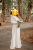 Buying this dress for my civil wedding was a very good decision. Material is nice, it flows around you, I felt amazing wearing it and received many compliments. One of the buttons fell off immediately when I was trying it out, but that is something you can fix easily yourself. No other issues and delivery was fast. - Megi S.