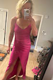 The dress is pretty, overall. The fabric is soft and not restricting whatsoever. The location of the slit is a little too centered in my opinion. There's also a weird extra space and folds around the hips, which is odd for me because I consider myself more curvy than not. - Kayla C.