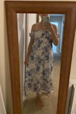 Bought this dress for a beach engagement shoot, and I think it'll be perfect! The sizing feels true to size for the body/torso area, but the strap is a little tight around my arms. I know it definitely won't skip down! - Rachel C.