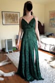 This was a beautiful dress, great quality and color, but it was a little too big overall and way too big in the chest area. Wouldn't recommend it for super slim and/or smaller chested ladies. Also a bit long in the skirt for me; I'm 5'5. - Darcy G.
