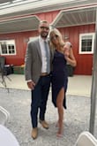I'm obsessed with this dress. It fits like a glove. The slit and one shoulder strap added a little extra sass! Not a stretchy material because it's satin but it did not affect the fit. Would definitely recommend it! - Kara B.