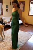 It fits like a glove! Perfect length and has nice fabric. The color green isn't as bright as pictured. The strap is pretty flimsy, so be careful when you put it on. - Darcy G.
