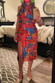 Loved this dress! After reading other reviews, I thought it would be best to size down, and it fit great! It was comfortable to wear all night and super flattering. - Melissa S.