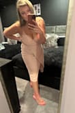 I bought this dress for "pink night" at a friend's [bachelorette]. I was 11 weeks pregnant at the time, so I had gained a bit of weight. I wanted something modest and classy but flattering for a night out. This shaped my bump (generous word for my extra uterus cushion) perfectly, so as not to be noticeable, and looked so sexy with a slight curl in my blonde hair. - Katherine T.