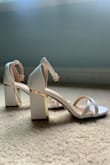 I loved the shoes! They look exactly like the picture and are perfectly comfortable. If you have small ankles, they might move around a little bit, but walking shouldn't be a problem. Perfect height and colors, will wear them again - Leah K.