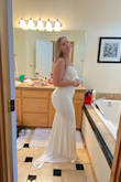 I loved the way this dress hugs my pear shaped curves! The adjustable straps are helpful too as I have a small bust. I will be wearing it when I get married on a helicopter in Vegas. I am wearing a size L with shape wear, but may size up to an XL to allow for a little bloating since the drinks will be flowing. - Laurel B.