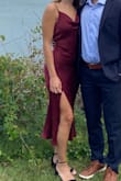 I got this last minute for a wedding and it's now one of my favorite dresses! The material and buttons on the side elevate the look and it's a very flattering fit. It's only one layer without a slip so I was nervous of it being see through, but the dark red color was perfect - Julia W.