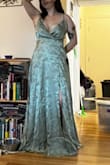 I love this fabric and color. I think it's so pretty and feminine. And the slit is a great height on me. I had to get a little length taken off at the tailor, but I wasn't drowning in it when I wore heels. The only problems I really have with the dress are some loose stitches by the zipper and a little bit of an awkward neckline. Wearing a strapless bra smoothed out the strange shape, though! - Hayley L.