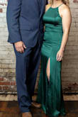 This dress is absolutely perfect!! I did get the dress hemmed a few inches and wore 4-inch heels. I bought a low-backed strapless bra that worked flawlessly. The emerald green color was a hit!! I received a lot of compliments. - Megan W.