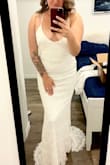 I am very impressed with the quality, fit, and overall look of this dress. I was very skeptical of purchasing a dress with no reviews but I'm glad that I did! I bought one size up though because it says that the fabric has no stretch and it fit perfectly. Will need to wear some pad inserts to hold the gals in place but that's it. Don't need to hem the length either since I'll be wearing heels (I'm 5'8). Don't miss out on this dress!! - Nataya D.