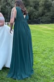Such a beautiful gown. I wore it as a bridesmaid. It was long and elegant and I felt beautiful! Comfortable and elegant. - Jessica P.