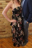I wore this for a late September wedding and it was so perfect! I received a ton of compliments. The length was right around my ankles in flats, but it can be adjusted with the straps. I wore sticky cups with it, but you could probably go braless if you prefer. It does wrinkle easily and was pretty wrinkly when I received it. I had to steam the whole thing right before the wedding, so make sure you plan for that. - Kim S.