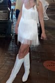 I bought this dress for my bachelorette trip and it was perfect for the Barbie cowgirl night. It was really comfy and the adjustable straps are great. I am on the taller side, so the dress was extremely short, but the longer fringe ends made me feel more comfortable. Overall, it was great quality, and I definitely recommend it! - Rachel Y.