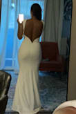 This dress is by far my favorite. It hugged my body in the right places and the material was not heavy. It's also not see-through and easy to move in. I took a chance and ordered this dress with no reviews and I'm glad I did... I can't wait to wear this dress to my wedding reception. - Addishiwot A.