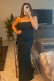 Muscle mommies, size up if you have a wider bust/lats. I'm normally a M or a size 6/8. I ordered both sizes to compare and the 8 was perfect. The bodice fit similarly in both but the bust of the size 6 was too snug. - Carla V.