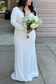 Fit perfectly! I love the elegant style of the dress, the material was soft and comfortable. I hate showing off my arms and shoulders and this dress just made me feel so confident and sexy! I would recommend it to any future bride. - Laura S.