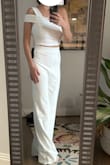 It's cute! It fits SNUG around my belly though, so have some shapewear ready because I had to suck in! Also, I will need to get it hemmed before I can wear it out because even with heels, it is way too long. - Katie C.