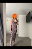 This dress is very flattering with the ruching and very stretchy. I would have sized down to an XS if it were available. I'm typically a size small. It didn't look too big, I think it might have been a little more curve-hugging in an XS. - Lauren K.