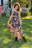 Loved it! I ordered last minute, and it was perfect for an outdoor wedding. Just enough coverage for when it got colder at night, but open enough for the end of summer heat for a ceremony outside. I will say, as someone who doesn't fill out a lot of dresses, the straps were a bit precarious at times. However, not enough to be a big problem with dancing. Highly recommend!! - Izzy S.