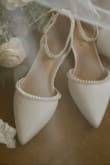 I originally bought sandals for my summer wedding. However, my seamstress hemmed my dress a little shorter than I wanted, and my toes were sticking out so I rush-bought these shoes, and they arrived only 2 days before my wedding. They were absolutely perfect. They fit right, and they were very comfortable; I had no blisters. I only wish I didn't get them so dirty or I would've kept them forever as a wedding keepsake. - Jennifer E.