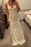 I think this is the one for my beach wedding next year! I own at least 20 other Lulus dresses and have tried a few of their wedding dress options. This one was the most true to size comparable to other dresses I've bought in XS. It fits like a glove, I may only have my mom replace the straps to be nicer and pull up the train some in the hemming. It feels and looks very high quality, while also being light to wear. The lace patterning is very intricate and looks great in photos. I've tried a few wedding dresses from other sites as well and this has been the best by far in the boho, Anthropologie-like style without the price tag. - Laura W.