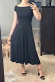 It's ok but a little boring. Would be ok for a funeral. The shoulders are also a little stiff. Doesn't really fit my body type so I'm returning it. - Kat S.