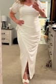 I loved this dress. The material is thicker and heavier but it fits gorgeous. Loved it, it was a little long for me. Ended up wearing a lighter dress because of the heat. - Emily A.