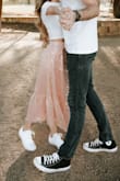 I've gotten a lot of compliments on this skirt. I absolutely love the light pink color and length. This was worn for my engagement photos and photographs really nicely. - Madison K.