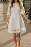 I wore this as one of the outfits for my engagement shoot and it was great. My only complaint is that I have the same exact dress, same size, from Lulus but in red, and this white one doesn't fit quite as well/flatteringly. The most notable difference is in the sleeve width, which I feel they are too wide and boxy. It's always a little disappointing to get something you love in another color only for it to fit slightly different. - Madison K.