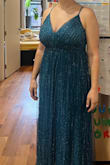Bought this for a wedding as a guest, and it's a bit too sparkly/stripes quite shiny. It feels more costume than elegant. I'm also large busted, and the way the chest area was tailored made me feel like I looked larger than I was. I didn't realize til I tried to return it that it wasn't eligible for return, so I have to keep it. It'll go in my costume box... - Jamie K.