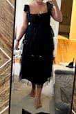 It's pretty and fits okay, but I didn't like the top of the dress, especially in the back. It's kinda loose. - Maggie S.