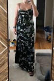 I loved this dress so much and wish I had the confidence to wear it to the wedding I was shopping for. It's very flattering because it has two layers, and the outer layer isn't as tight. The pattern is beautiful. It was a smidge tight on me, but it had a slimming effect. - Maggie S.