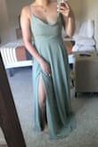 This dress is beautiful, and the lace-up back makes it perfect for adjusting the size. The dress is a bit long and will need to be tailored, but aside from that, I love it - Andrea M.