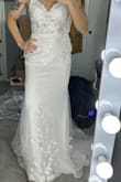 This was initially my number one choice! Very flattering, even better than pictured. Only thing that didn't work for me was the bust. It was a little low cut; I don't fill it out completely because of my bust size. When I bent down, the top was very revealing - Darina L.