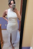 I have always been one who loves fun and a little bit different clothes, so this was just the right amount of classy and sassy for our courthouse wedding! I ordered the Large and the Medium. Between the two, the Large is better for its proportions, but I am still going to take it in a little bit. The collar, especially, is a little large, and I will have to take that in by a few inches. Photos shown are from before alterations. - Dina L.