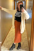 Love this skirt! This is the perfect addition to my fall wardrobe and can be dressed up or down. I also tried this on with a variety of different boot heights/styles and it looks great with all of them. The material is thick and high quality. Absolutely recommend! The waistband is pretty thick and tight though, so if you're debating between sizes and a bit thicker/wider in the waist, size up. - Lindsay C.