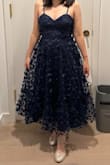 Dress fit perfectly and is super adjustable. The skirt itself is fairly floofy which is making me hesitate if I should wear it to a wedding. The dress is ankle length on me (5'2). I wish the bra area was more padded, it is just double lined like the rest of the dress. Out of the lulus dresses I've tried on so far, this has the best quality fabrics. - Annlee L.