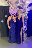 I loved this dress so much I didn't want to take it off at the end of the night! I'm 5'10" and it was the perfect length for me. The slits are very high but I loved that and did no alterations. The sides puckered when I tightened the straps but fabric tape solved everything. - Keisha M.