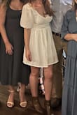Loved this dress! I read other reviews and decided to size down from my normal medium. It felt slightly snug above my waist but was wanting to fall off my shoulders so I wouldn't have been able to wear my normal size. - Haley P.