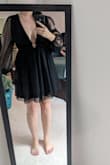 I usually wear a large in Lulus (I'm 5'4" and 160 lbs, busty) but for this particular dress, the large was way too small. I had also ordered the XL and it fit much better around the ribs. However, I found the sleeves to be extremely baggy. They weren't too much more baggy than the size L but it just gave the dress an overall frumpy and funeral-esque look on me. I returned both sizes. - Cara O.