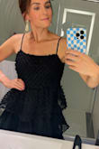 I bought this for a fundraiser gala and got so many compliments. It fit perfectly and was also comfortable. For reference, I'm 5'8", 140 lbs, and a bit pear-shaped. This dress was very flattering and a fun take on a black dress. Highly recommended! - Dawn K.