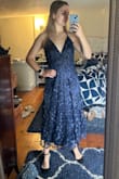 Absolutely LOVE this dress! It's so elegant. Love the glitter and 3D look to it. I'm wearing black heels but definitely will purchase some silver heels I think. If I had to complain about anything, it would be that the glitter is contagious, meaning it gets everywhere. But I'm not too mad about that lol. - Grace M.