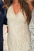 I tried on about 9 Lulus wedding gowns, this was the last one and it was it! Fit like a glove but not too tight. It was not too heavy or too long. I didn't have to make any adjustments and was able to wear a bra with straps without issue. Thank you Lulus for a beautiful affordable and great quality garment! My favorite part was the beading design (sort of reminded me of the 20s!) and the bottom of the dress with the subtle tulle! - Stephanie H.