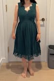 This dress fit but the shoulders were not sitting right. It also had an awkward shape on me making me look like I had a tummy. It might look better on someone taller. I also didn't love the lace material. - Annlee L.