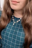 I was looking for a timeless, short statement necklace, and this fit the bill! Long chain to customize the length, depending on if I'm wearing something high or low neck. It's comfortable to wear and doesn't snag my skin or clothes. Effortless beauty for work and nights out! - Madison G.