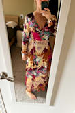 This wrap dress is easy to put on and comfortable. I can wear a regular bra and flats! (It hits me right at my ankle - 5'4") Dress it up with some jewelry, and you'll be good to go! - Amanda R.
